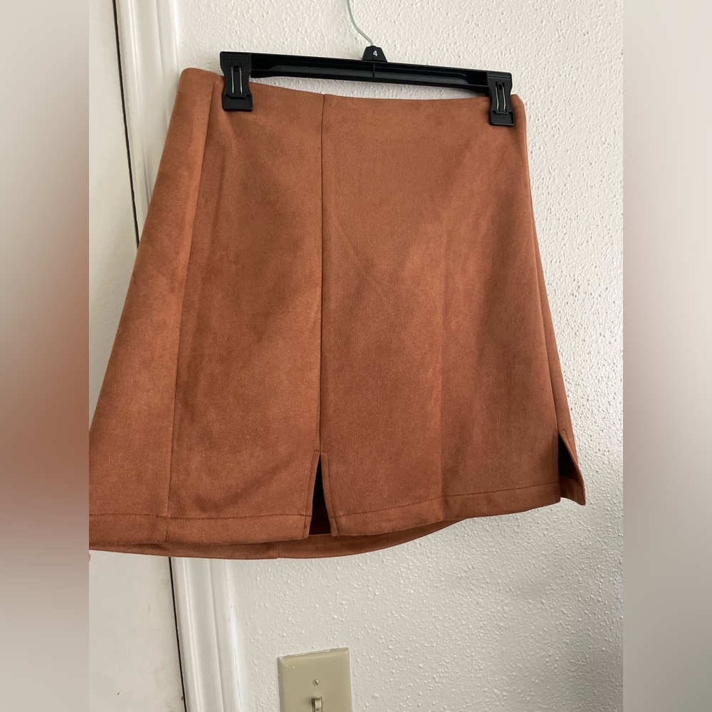 Burnt orange skirt worn once size large, purchased at a boutique